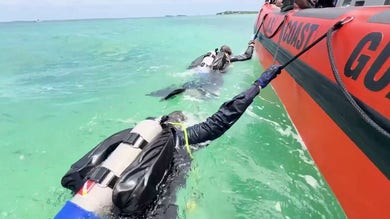 Coast Guard divers search the sea floor to find any trace of missing woman Lynette Hooker