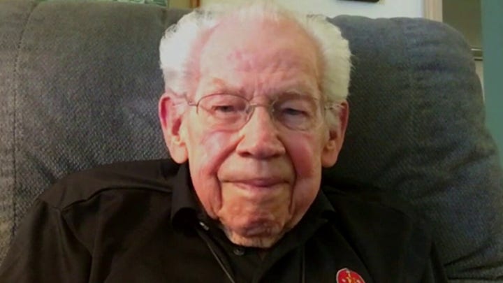 WWII veteran on History Flight identifying remains of two friends lost at war