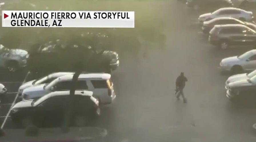 Three wounded in shooting at Arizona shopping center, suspect in custody