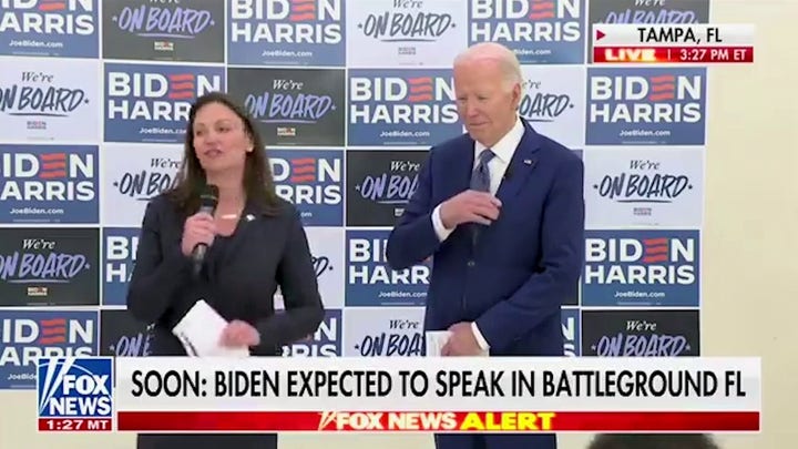 Biden makes sign of the cross while rallying for abortion access