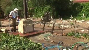 Vandals knock over, deface statue of newly canonized saint