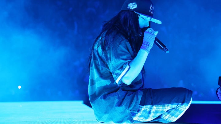 Billie Eilish suffers onstage mishap as singer trips down stairs during a concert