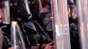 Oklahoma detention officer quits job after being told he couldn't kneel with protesters