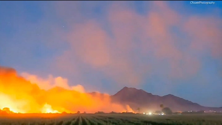 Arizona wildfire explodes in size outside Phoenix