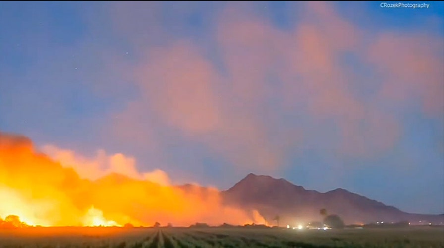 Arizona wildfire explodes in size outside Phoenix