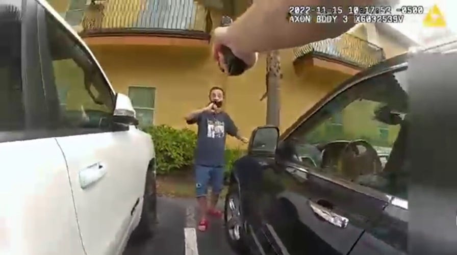 Body cam footage shows moment Florida police shoot robbery suspect armed with knife