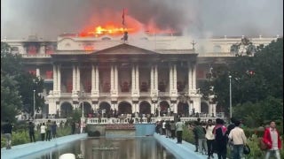 Nepal protests turn deadly as demonstrators storm parliament building and start fires