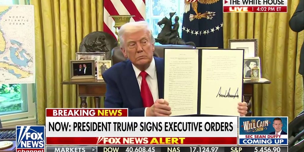 Trump signs executive orders after hiking tariffs on China, pausing on others
