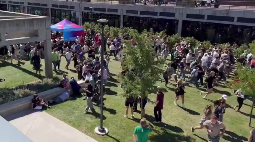 People run after Charlie Kirk shot at event