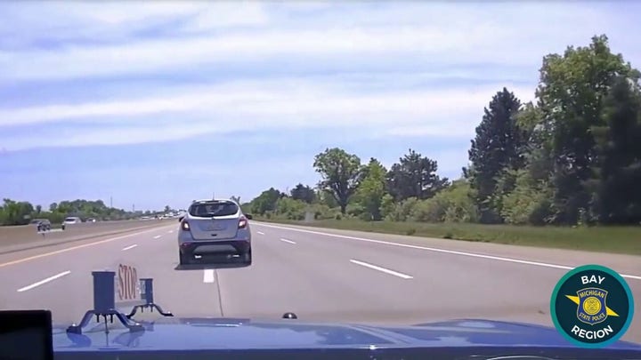 Dashcam video shows Michigan boy, 10, leading police on highway chase