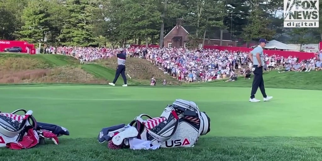 Bryson DeChambeau reacts to missing a birdie putt