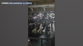 Phone flashlights save Texas high school's graduation ceremony after power outage