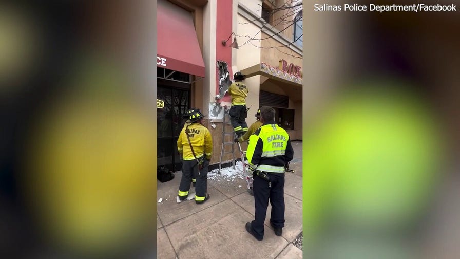 Firefighters cut through walls to rescue trapped burglary suspect