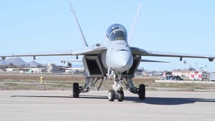 US Navy fighter jets practice before their flyover of Super Bowl LVII