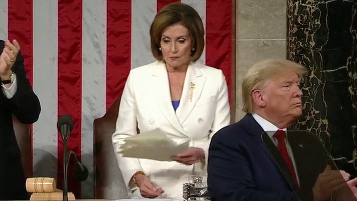 House Speaker Nancy Pelosi rips up her copy of President Trump's State of the Union address