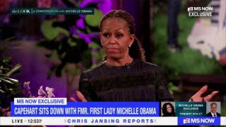 Michelle Obama says 'we have to pick leaders' that don't rob women of their femininity