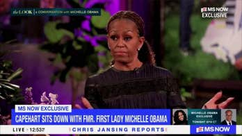 Michelle Obama says 'we have to pick leaders' that don't rob women of their femininity