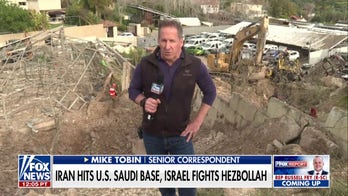 Impact craters show Iranian missile damage in Israel