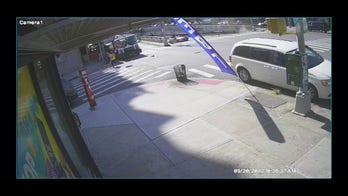 Surveillance footage shows boom crane falling on Bronx roadway