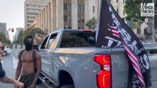 Anti-ICE protesters confront Trump supporter in Los Angeles