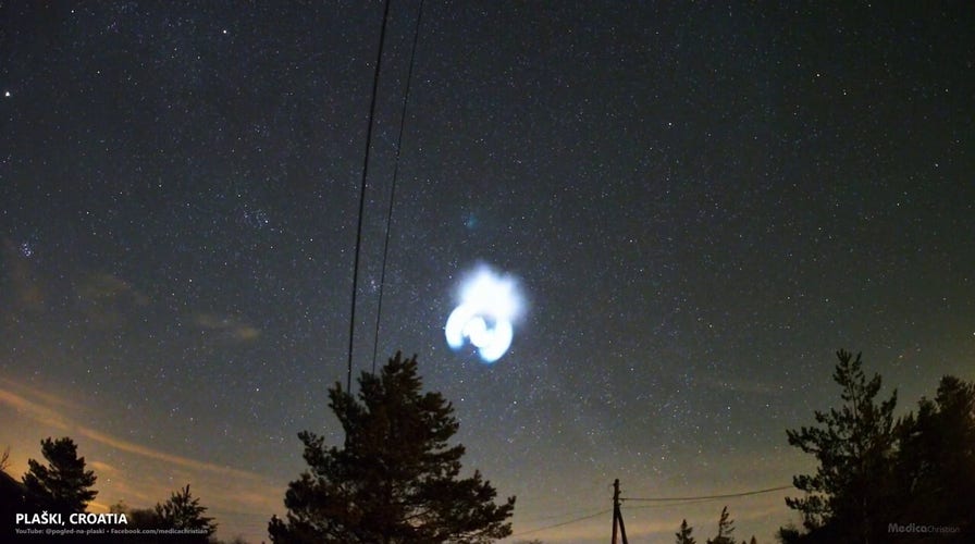 Spectacular blue spiral light from Space X rocket captured