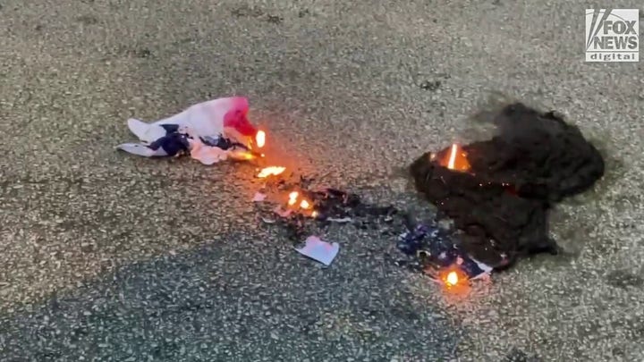 Anti-Israel demonstrators burn American flag outside Chicago consulate on 2nd night of DNC