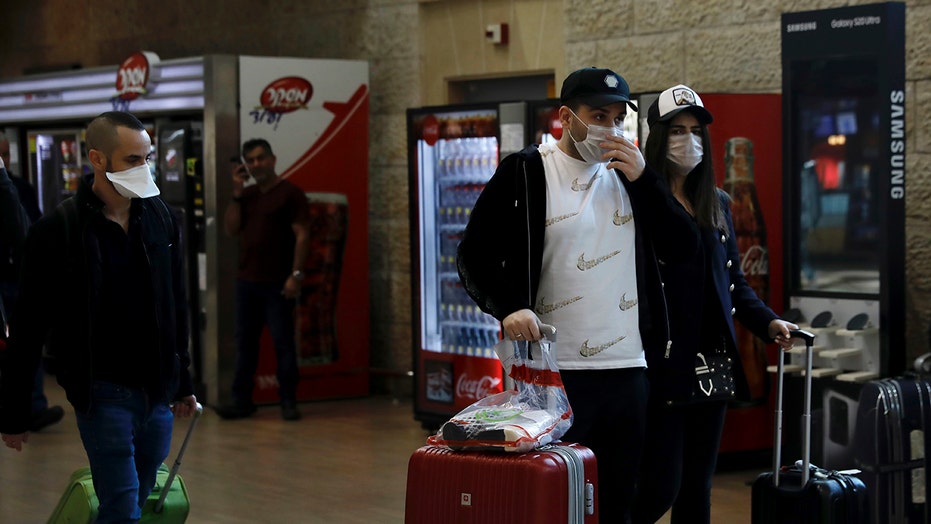 Israel imposes new travel restrictions as coronavirus spreads