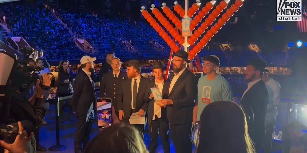 Nets honor Australia Hanukkah attack victims, light menorah