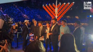 Nets honor Australia Hanukkah attack victims, light menorah