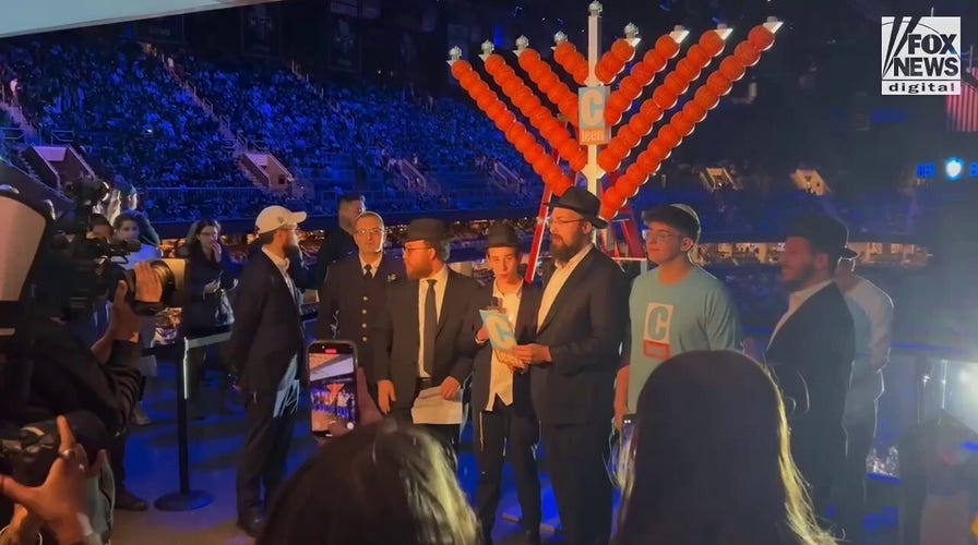 Nets grant Australia Hanukkah onslaught victims, airy menorah