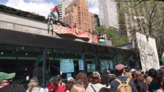 Fordham University anti-Israel protesters shout at NYPD, vandalize police bus - Fox News