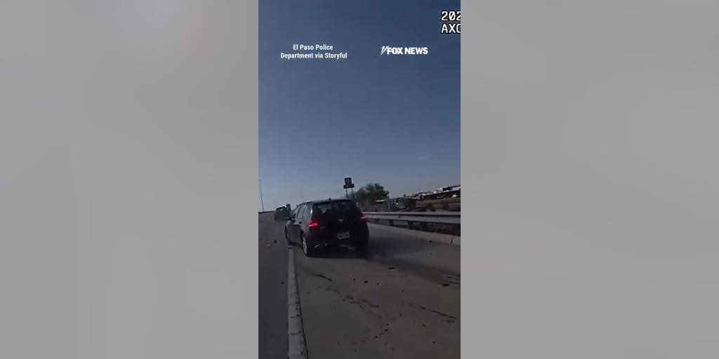 Distracted driver nearly runs over police officer during traffic stop