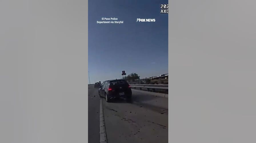 Distracted driver nearly runs over police officer during traffic stop