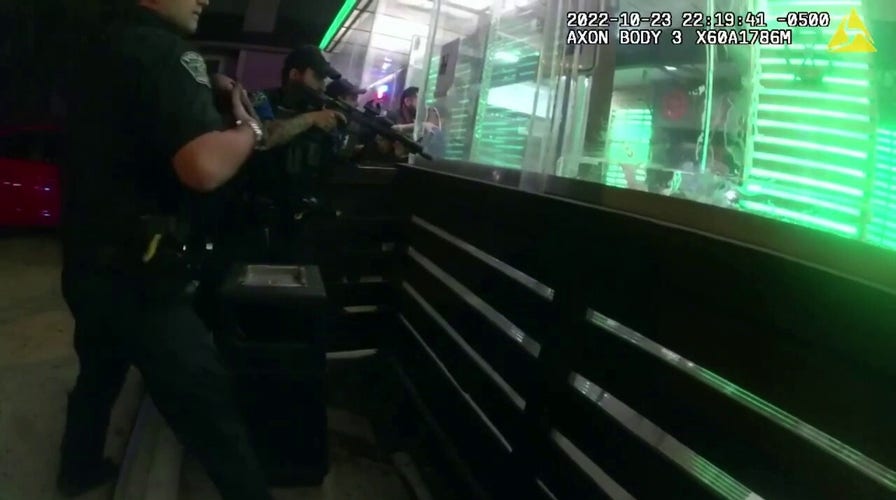 Austin police release body cam footage showing exchange of gunfire with suspect inside restaurant