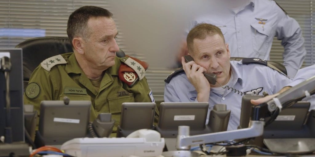 Israeli military leaders watching IDF strike Iranian targets from command center