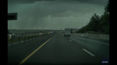 Lightning narrowly misses truck on Utah freeway