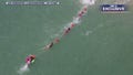 Lifeguards in Flagler Beach, Florida, formed a human chain to rescue a boogie boarder who appeared to have drifted far from shore. (Credit: Joe Osborne)