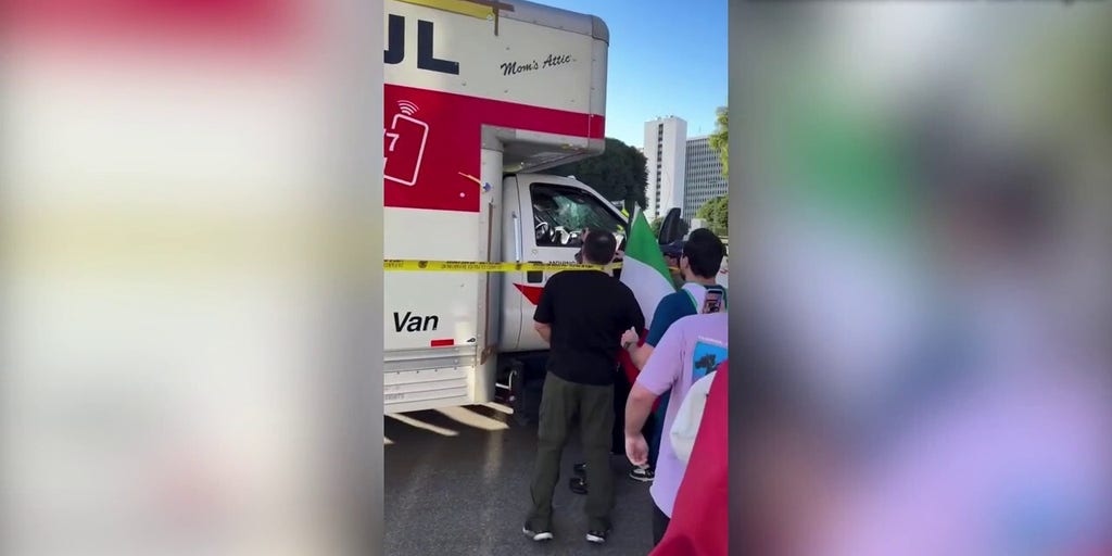 LA protesters swarm U-Haul truck that drove through anti-Iranian regime gathering