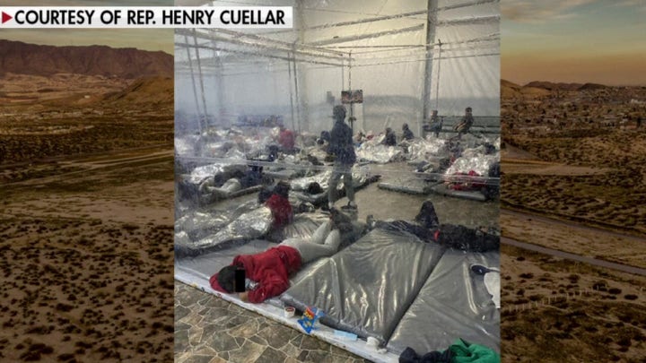 Images provided by Democrat show crowded migrant tent at Texas facility