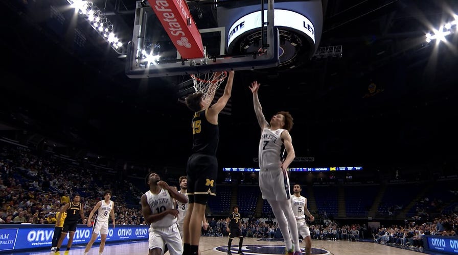 Michigans' Yaxel Lendeborg Lobs to Aday Mara, Who Finishes with a Slam Dunk vs. Penn State