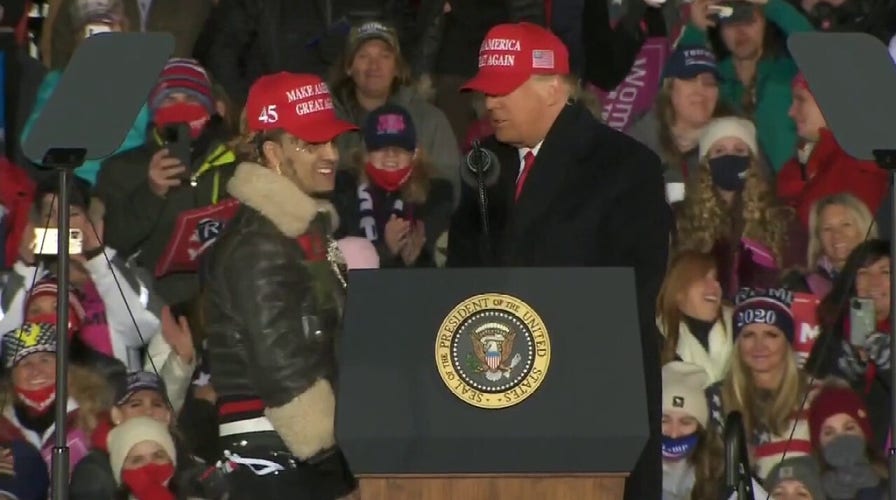 Rapper Lil Pimp joins President Trump on stage at rally