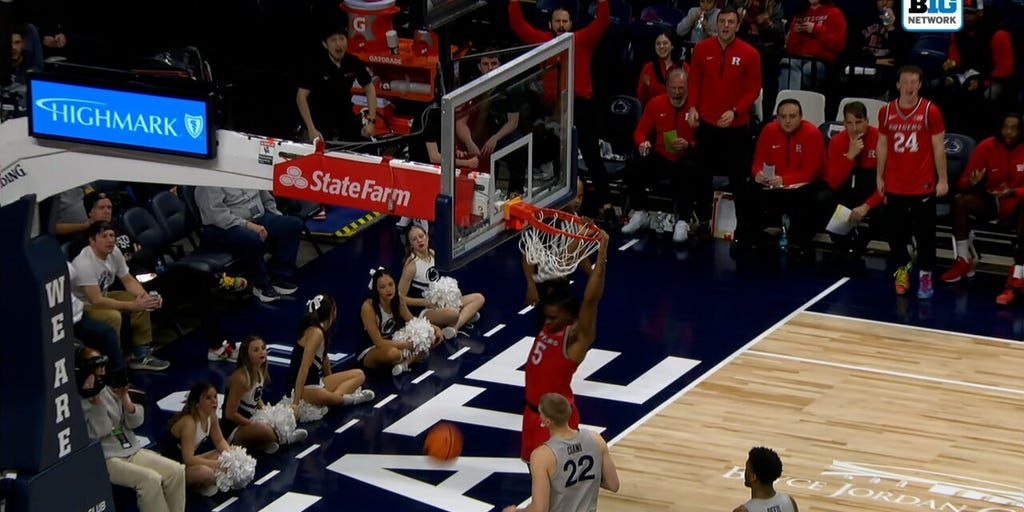 Darren Buchanan Jr gets up for a dunk, extending Rutgers' lead over Penn State