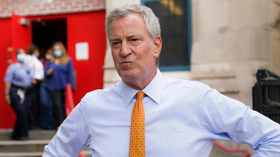 Homeless advocates protest Mayor Bill de Blasio's plan to move homeless out of hotels