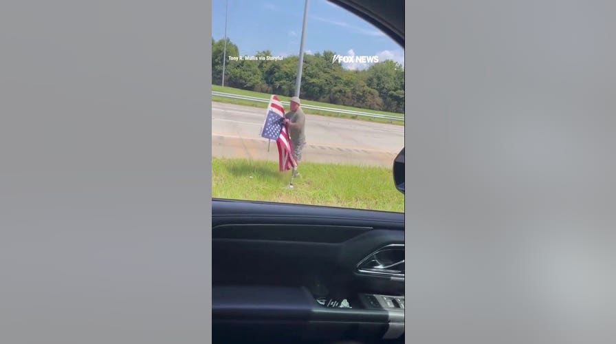 Double amputee Marine veteran rescues US flag from busy interstate
