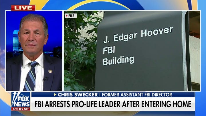 FBI arrests Catholic leader 