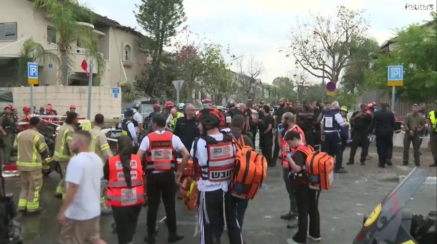 Emergency crew in Israel respond to aftermath of missile strike