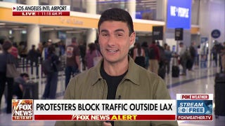LAX MADNESS: Protestors gather throughout airport and block traffic