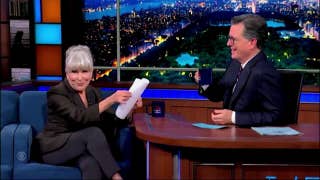 Bette Midler serenades Colbert with parody of 'Wing Beneath My Wings' attacking Trump