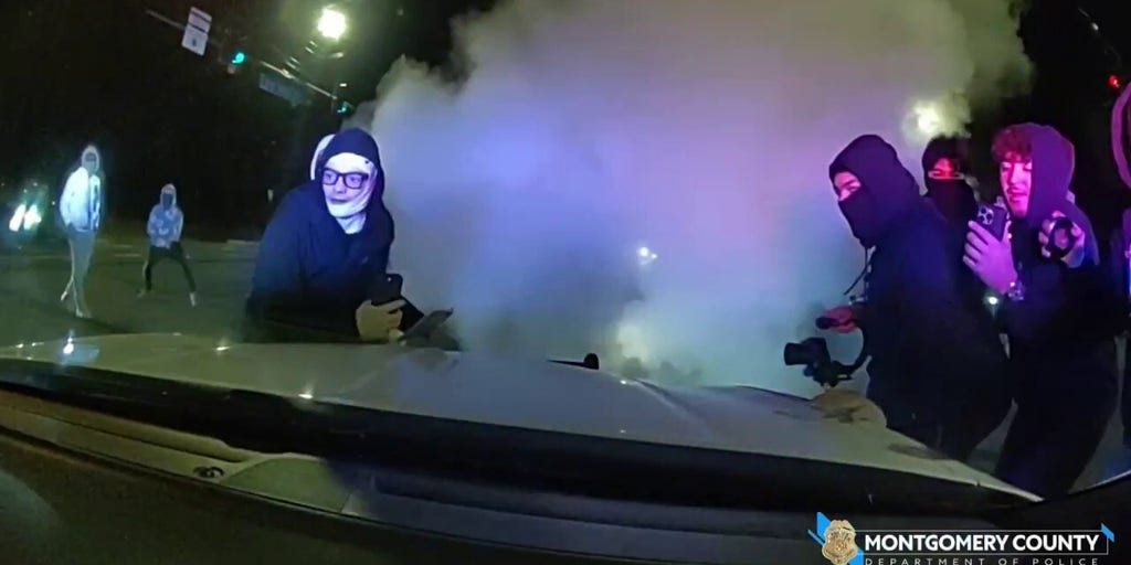 Police cruisers smashed as street takeover mob swarms Maryland road