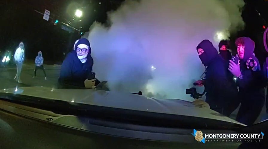 Police cruisers smashed as street takeover mob swarms Maryland road